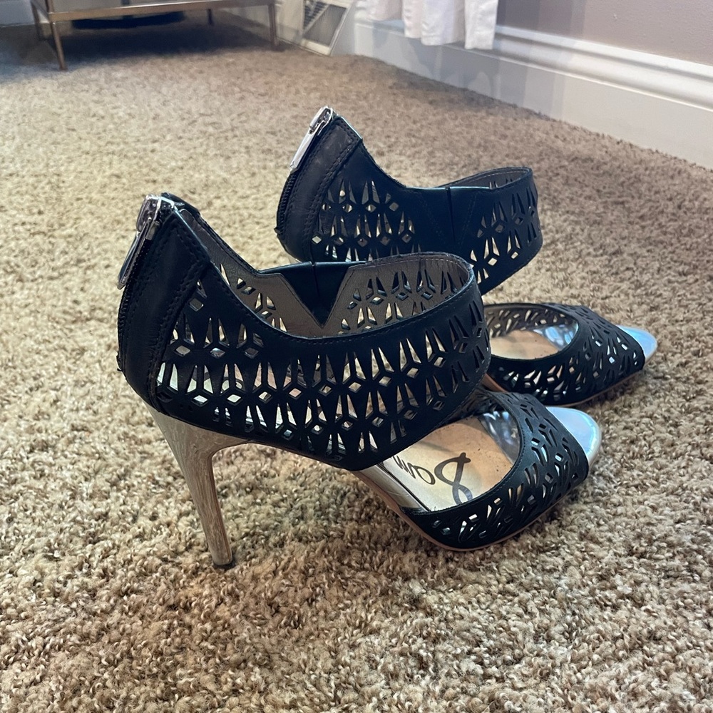 Sam Edelman Black Leather Cut Out Heels with zipper on heel and silver bottom